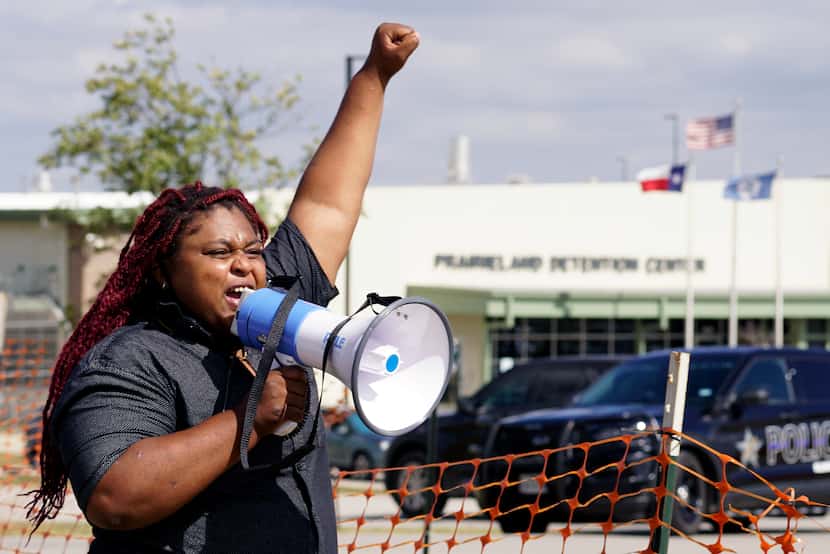 Indianna Taylor was among several supporters and immigrant advocates to protest at the...