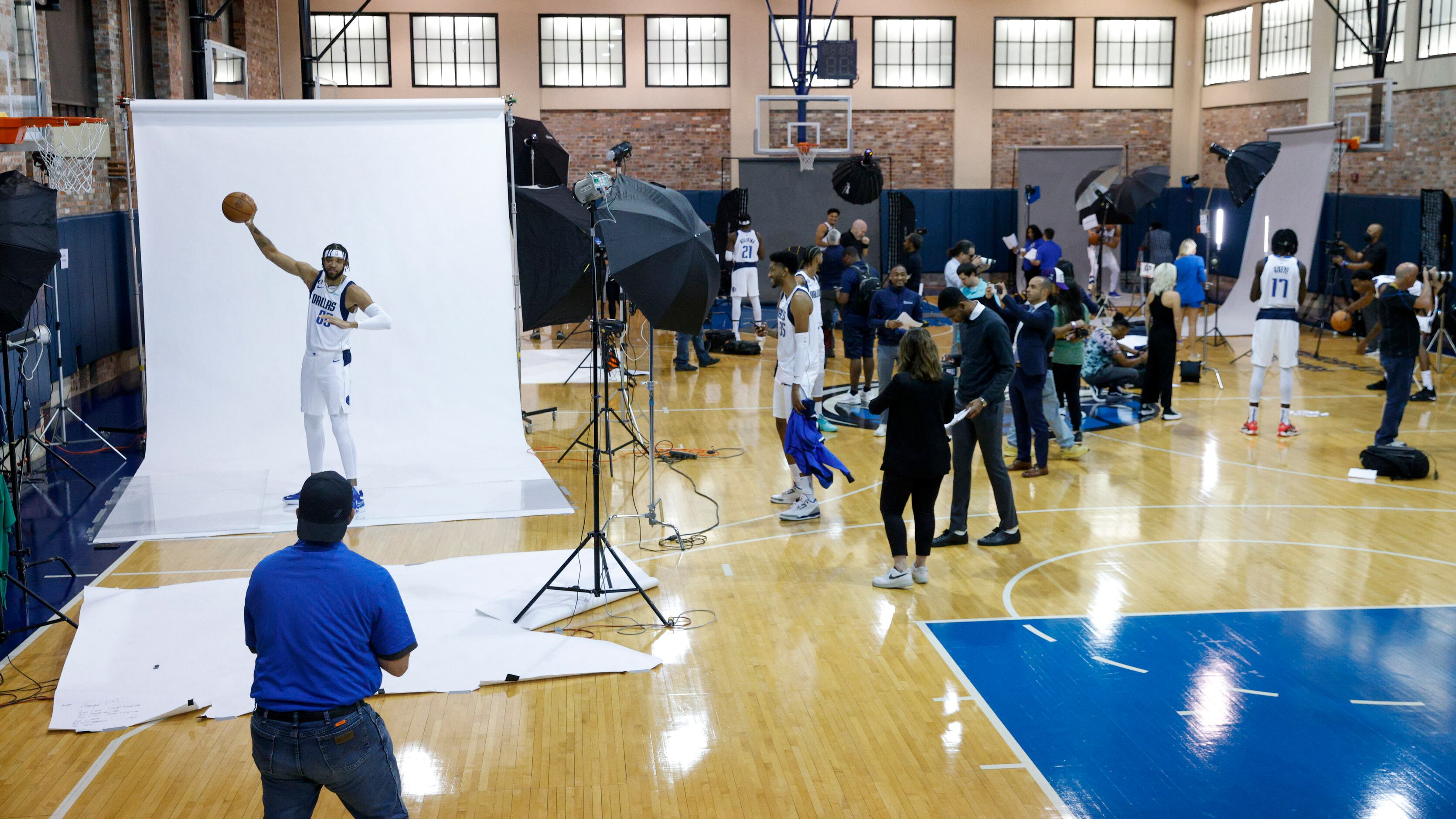 Dallas Mavericks center JaVale McGee (left) poses for a photo during the Mavericks media...