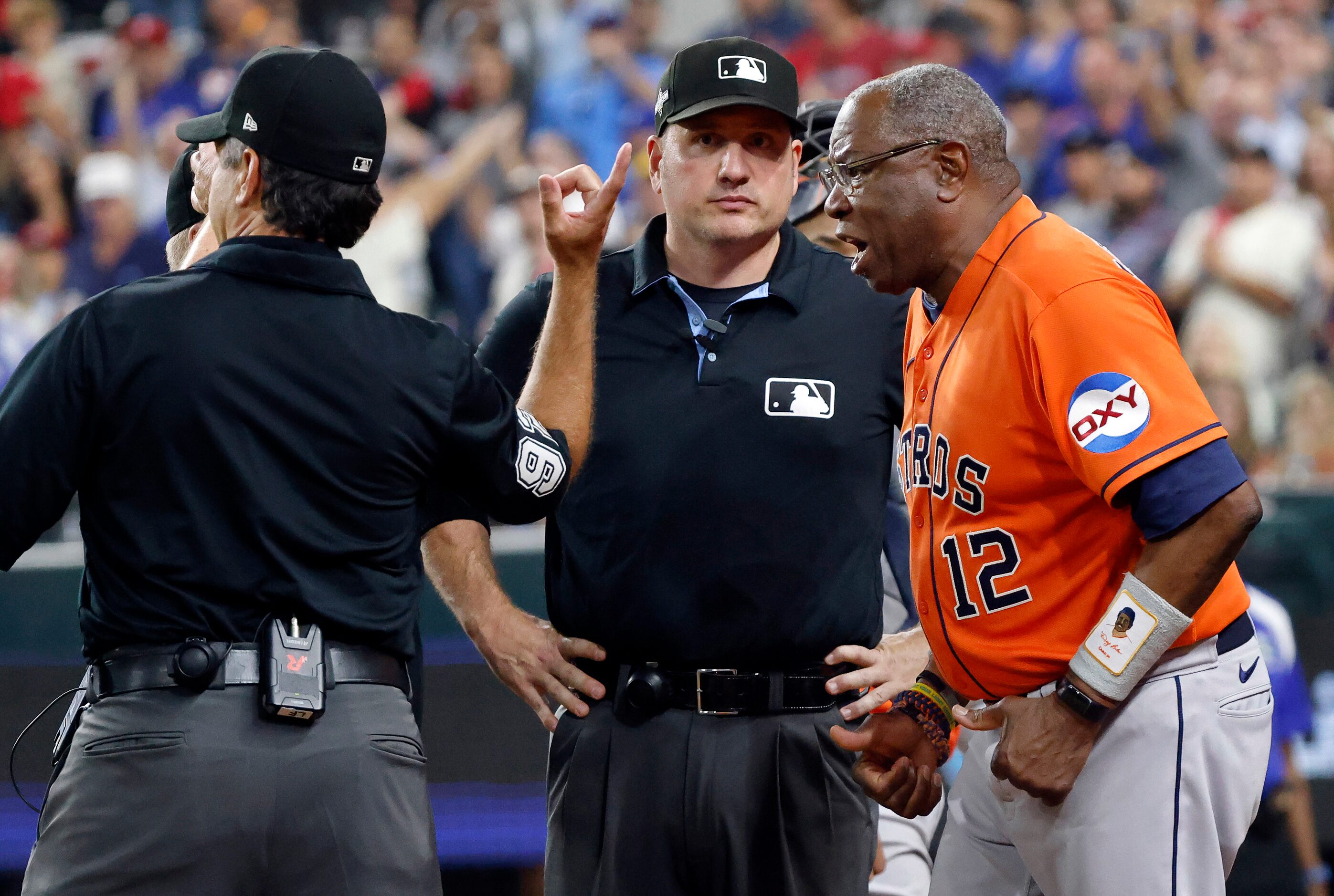 Left field umpire James Hoye (92) tosses Houston Astros manager Dusty Baker from the game...