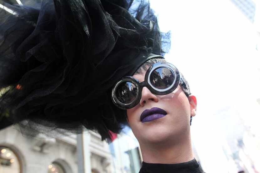 Markus Kelle poses for photographs as he takes part in the Easter Parade along New York's...