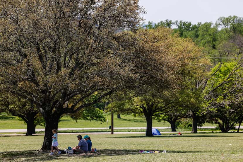 Residents enjoyed Monday's refreshing weather at Flag Pole Hill Park, one of the Dallas...