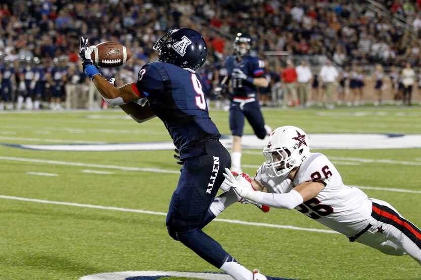 Allen's Jalen Guyton (9) reaches out to catch a 48 yard reception in front of Coppell's...