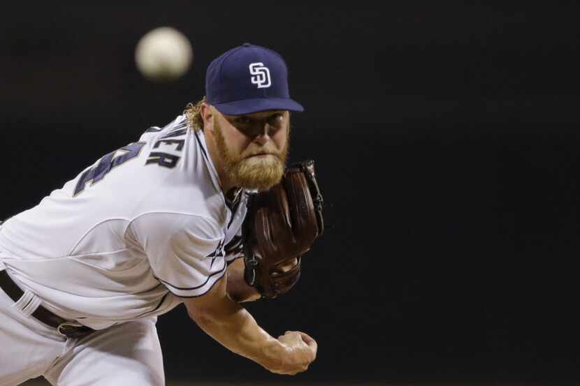 San Diego Padres starting pitcher Andrew Cashner pitches to a Philadelphia Phillies batter...