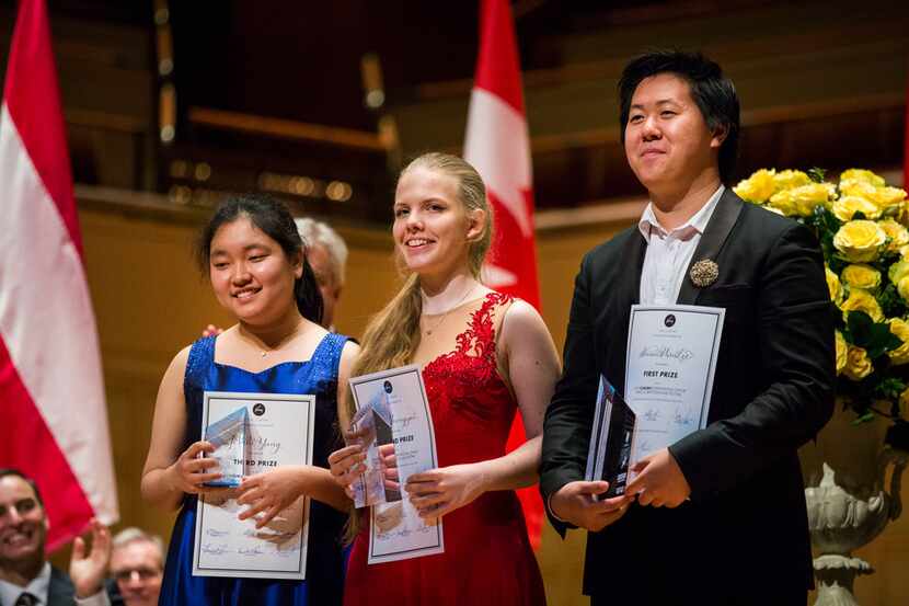 Pianist JiWon Yang, 17 (left), of South Korea, pianist Eva Gevorgyan, 15, of Russia and...