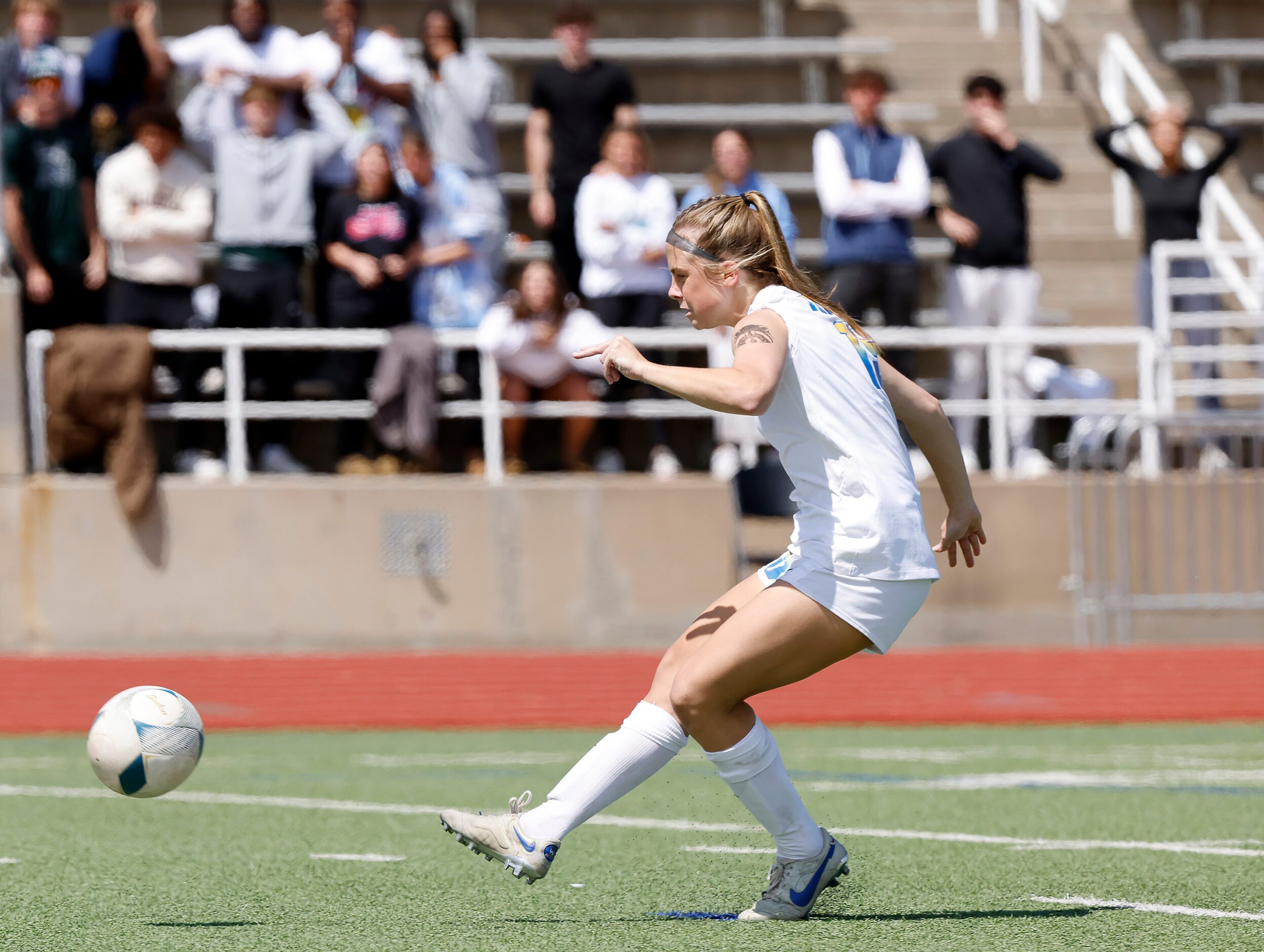 Frisco’s Taylor Vance kicks the final shot in a shootout to defeat Frisco Reedy in the girls...