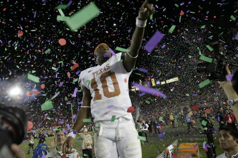 Texas quarterback Vince Young celebrates after Texas beat Southern California 41-38 in the...