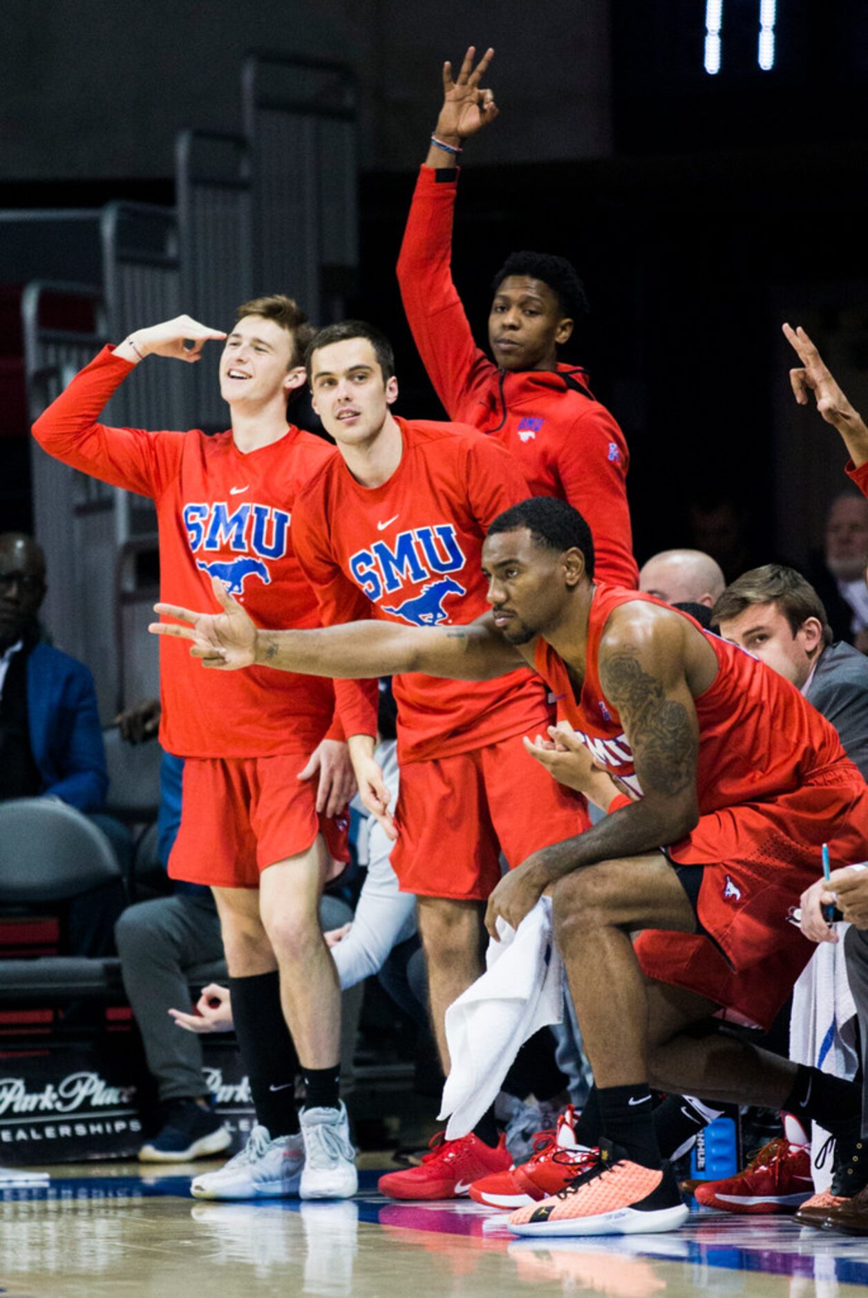 Southern Methodist Mustangs celebrate a three pointer during the first half of an NCAA...