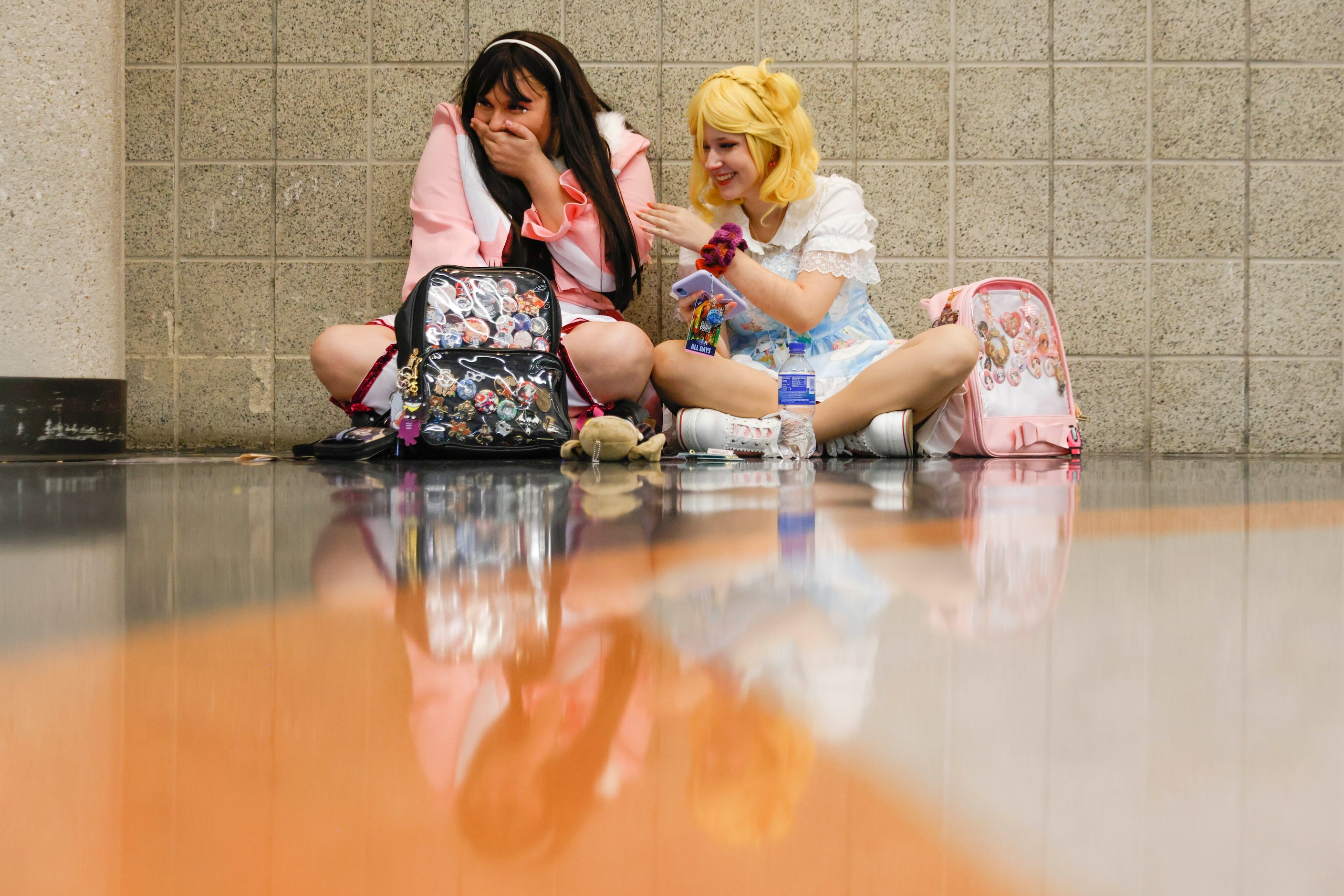 Luca Gomez (left) and Cloud Grimaldi dressed as Mari and Did from Love Live Sunshine reacts...