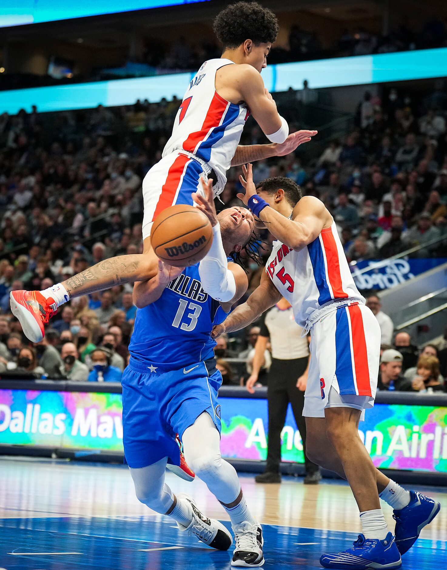 Dallas Mavericks guard Jalen Brunson (13) is fouled by Detroit Pistons guard Killian Hayes...