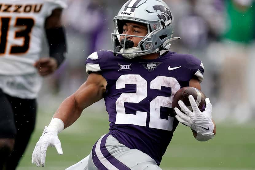 Kansas State running back Deuce Vaughn runs for a touchdown during the second half of an...