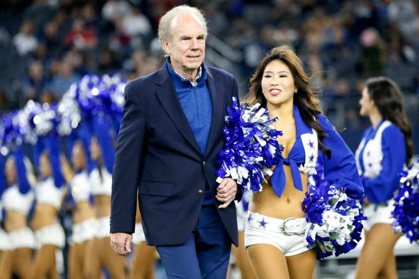 Former Dallas Cowboys quarterback Roger Staubach is escorted to Gil Brandt's Ring of Honor...