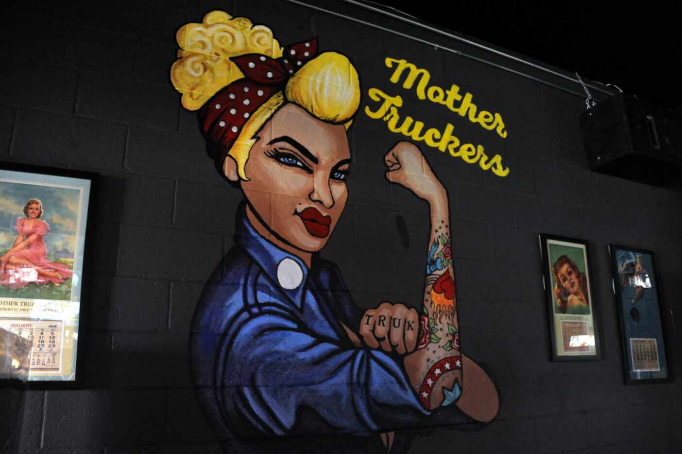 A Mother Truckers mural is painted on a wall.