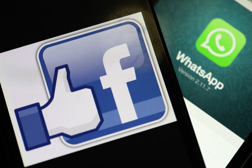 The Facebook Inc. logo for 'like' and the WhatsApp Inc. mobile-messaging application...