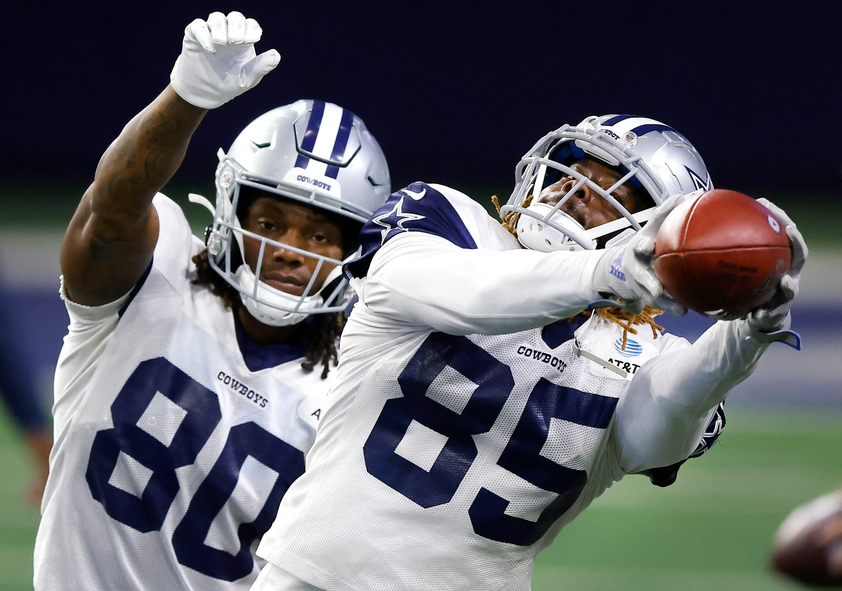 Dallas Cowboys wide receiver Noah Brown (85) catches a pass over the outstretched hand of...