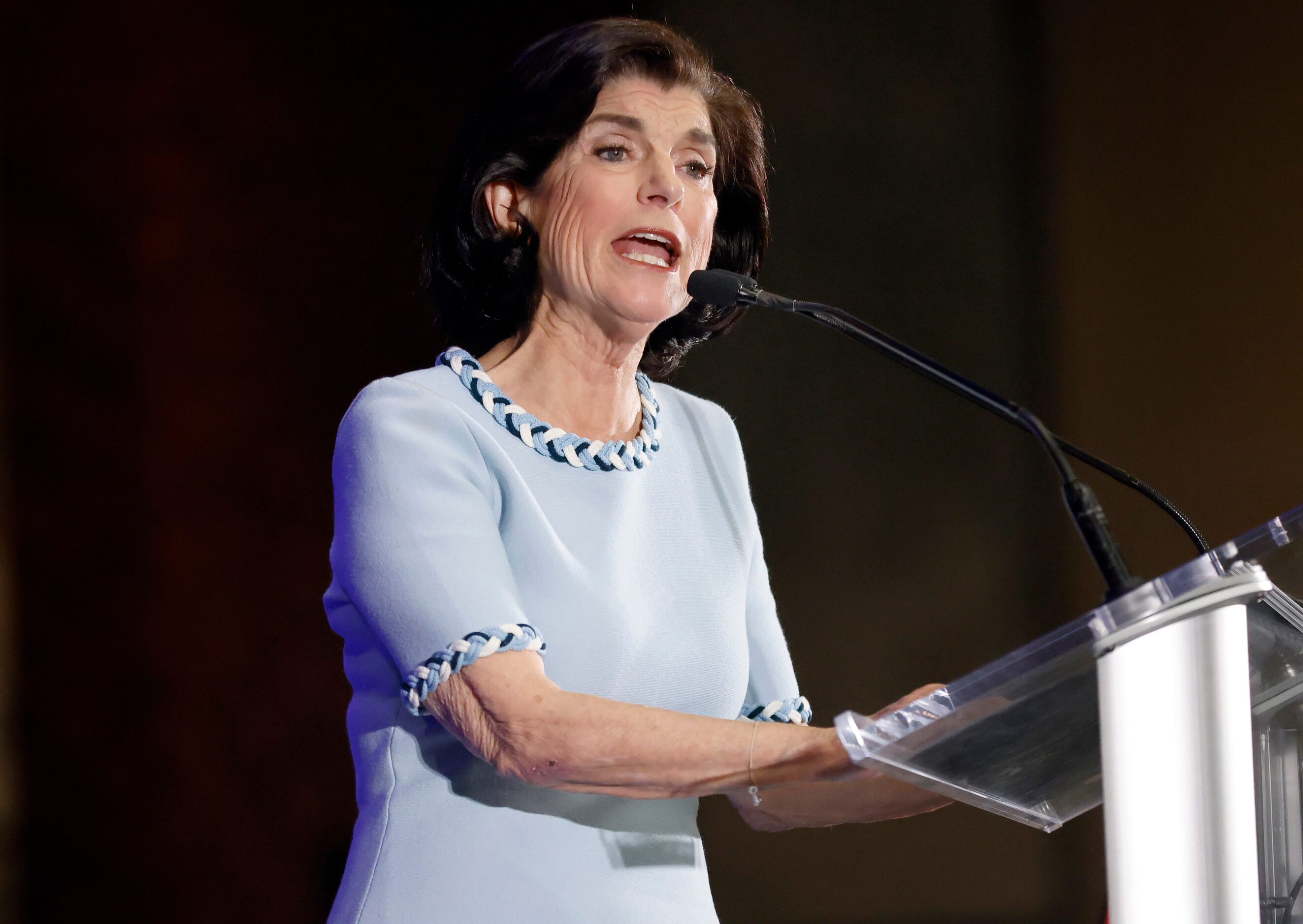 Luci Baines Johnson, daughter of President Lyndon B. Johnson (left) speaks before delegates...