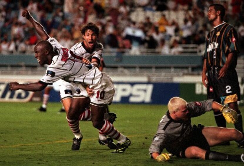 (10-08-97) Dallas Burn's Dante Washington (10) and  Daniel Peinado (22) celebrate...