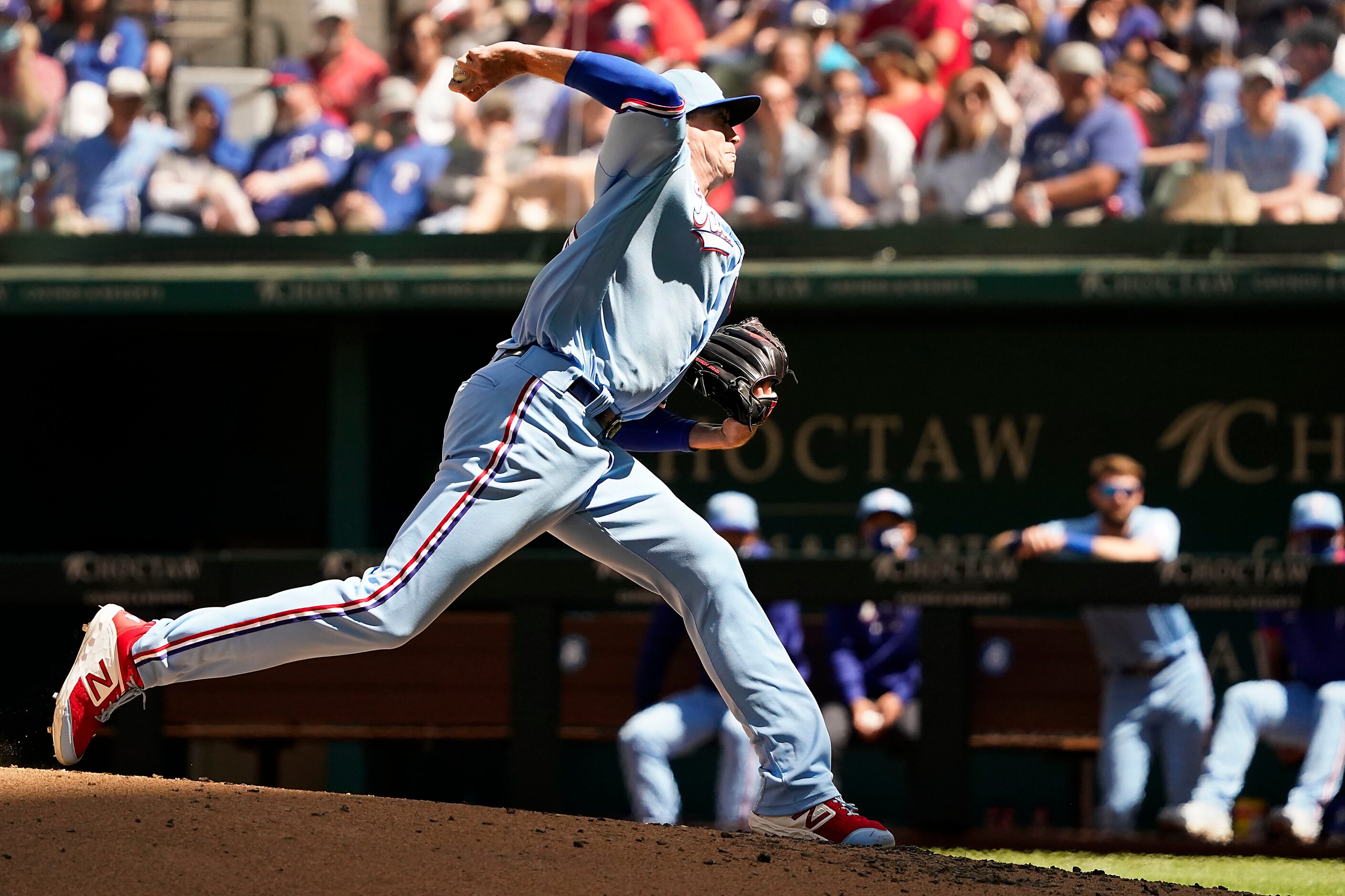 Texas Rangers pitcher Kyle Gibson delivers during the sixth inning against the Baltimore...