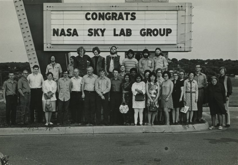 A marquee sign in Denton congratulates Pauline Beery Mack and her research group in the 1960s.