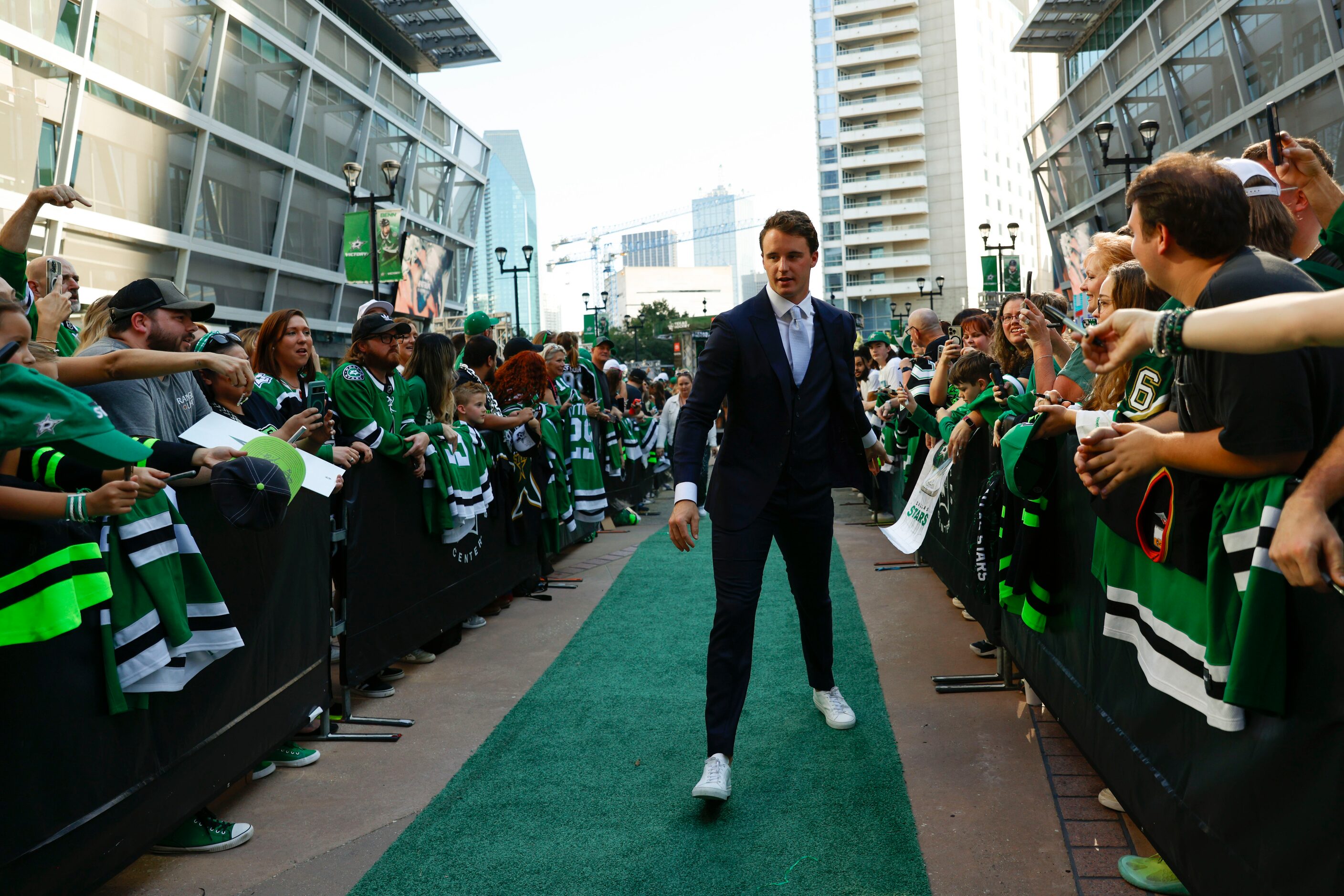 Dallas Stars goaltender Jake Oettinger greets the crowd during Dallas Stars' home opener...