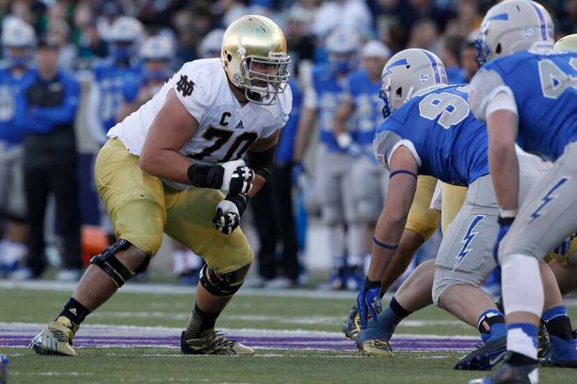 FILE - In this Oct. 26, 2013, file photo, Notre Dame offensive tackle Zack Martin looks to...