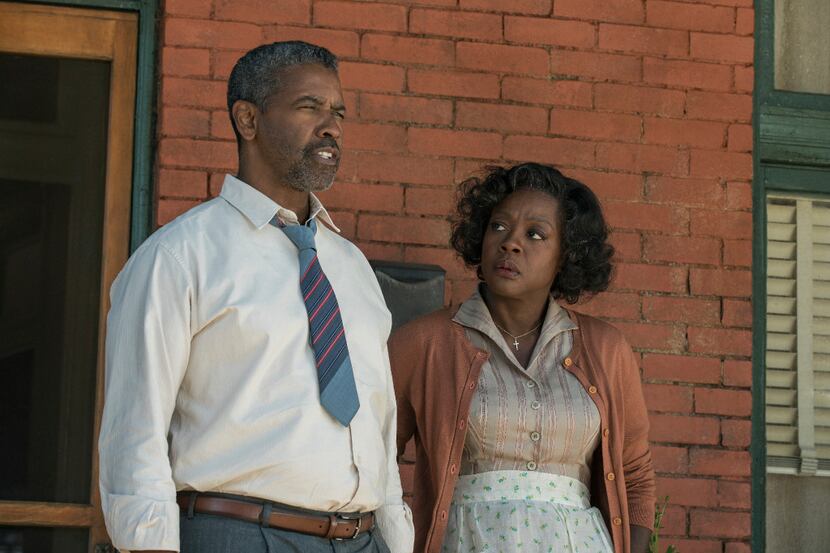 This image released by Paramount Pictures shows Denzel Washington, left, and Viola Davis in...