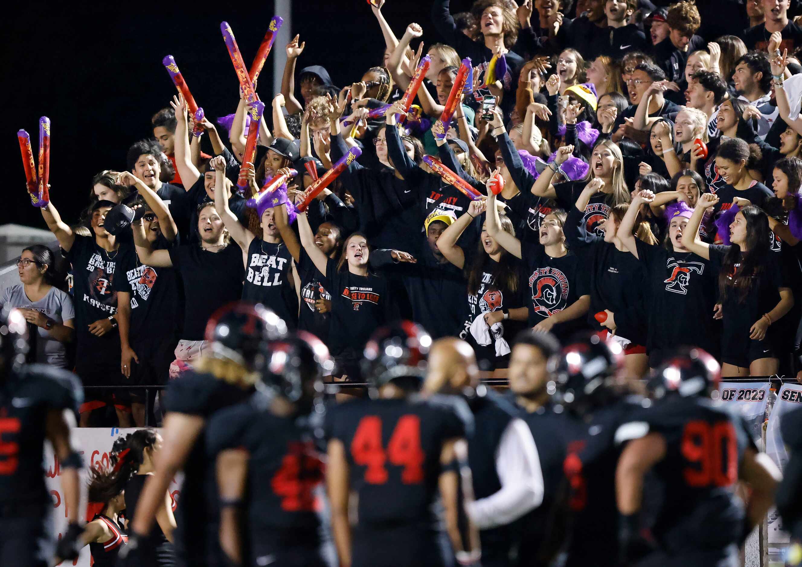 Euless Trinity students go crazy as their team makes it to overtime against Hurst L.D. Bell...