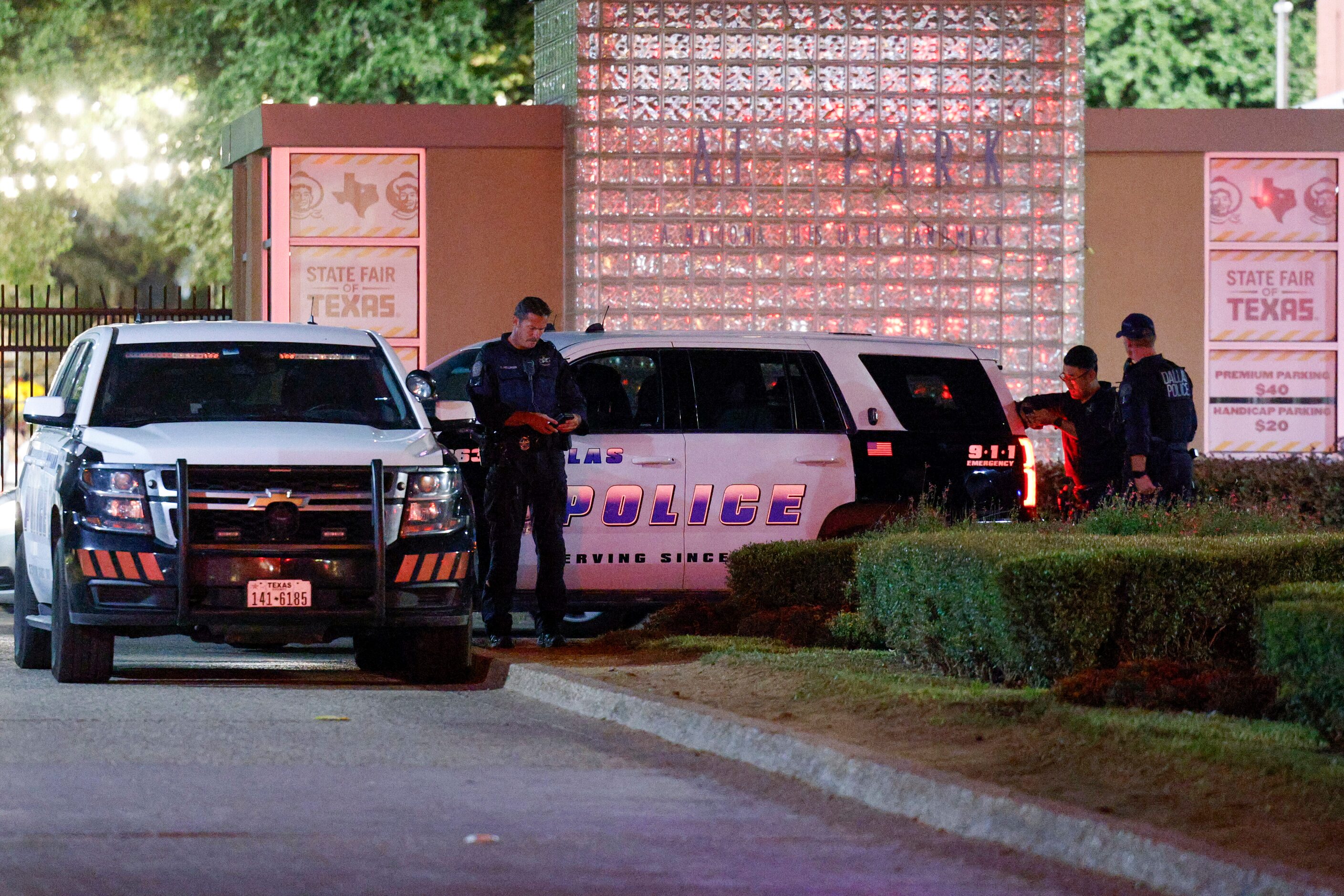 Dallas police block an entrance to the State Fair of Texas after a shooting, Saturday, Oct....