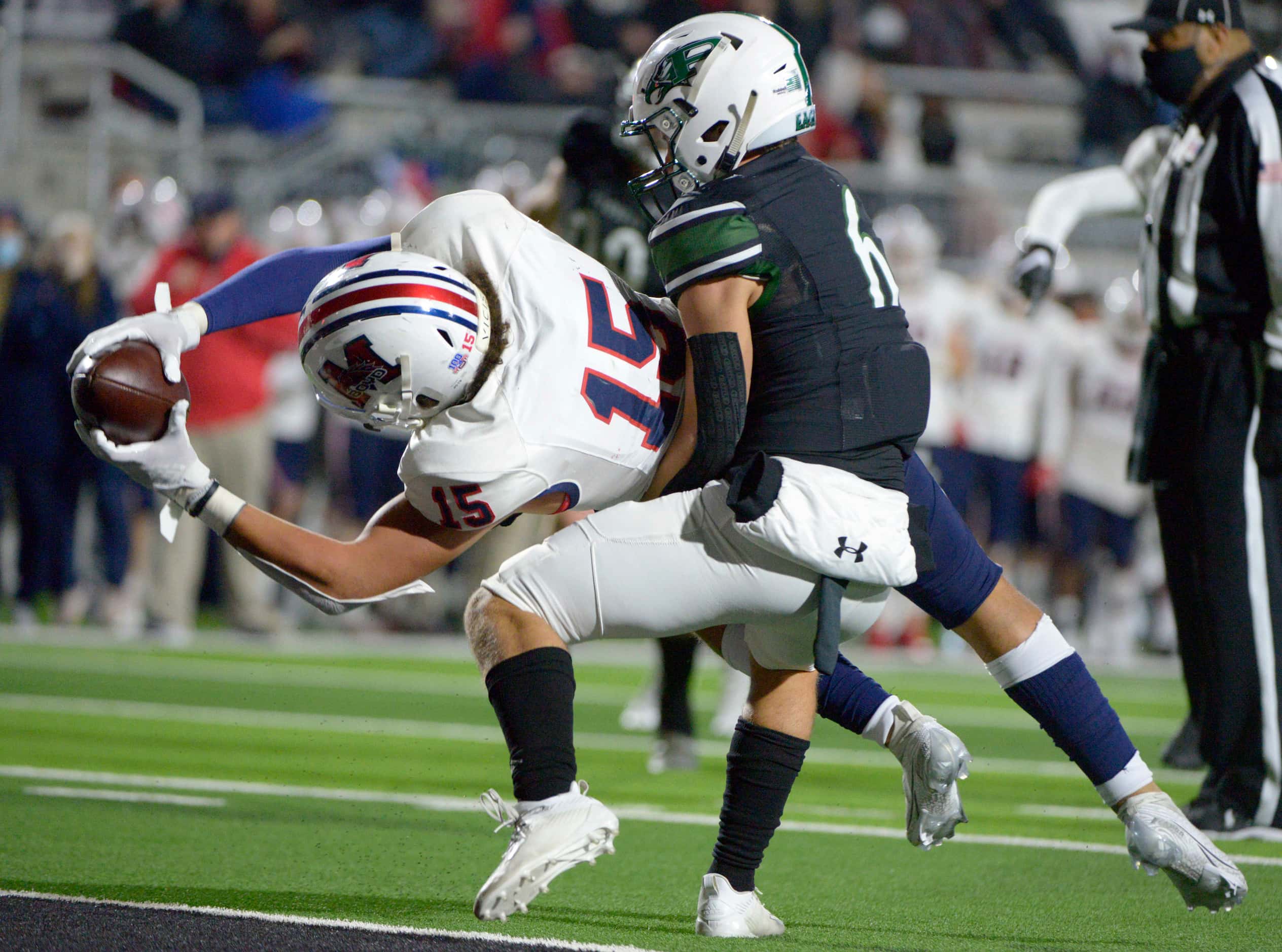 McKinney Boyd’s Carter Whitefield (15) reaches for a touchdown as he’s defended by Prosper’s...