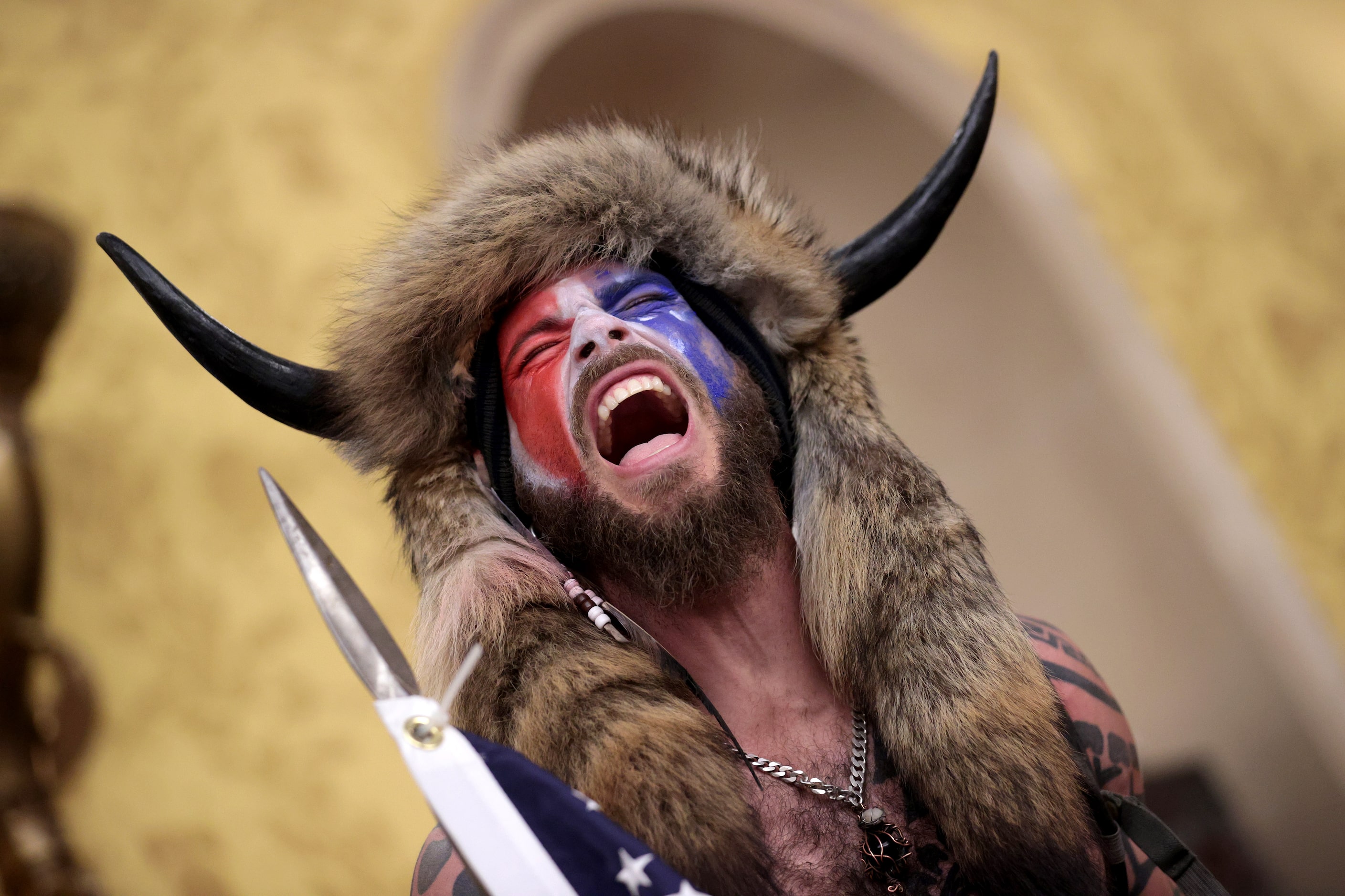 WASHINGTON, DC - JANUARY 06: A protester screams "Freedom" inside the Senate chamber after...