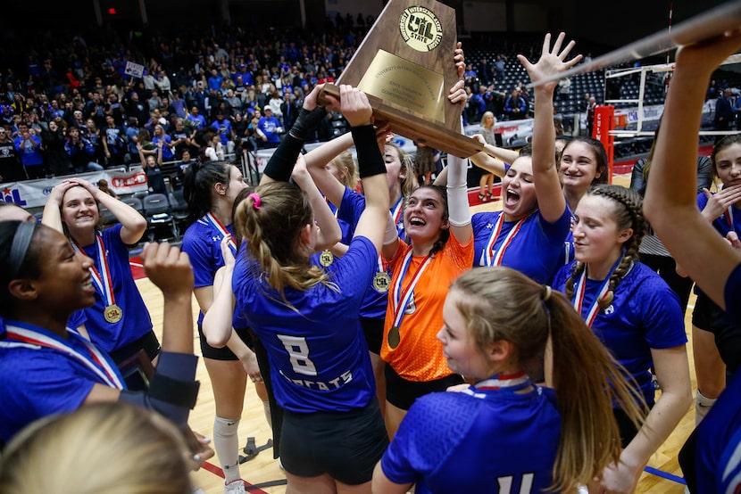 Trophy Club Byron Nelson Bobcats celebrate after winning the class 6A volleyball state final...