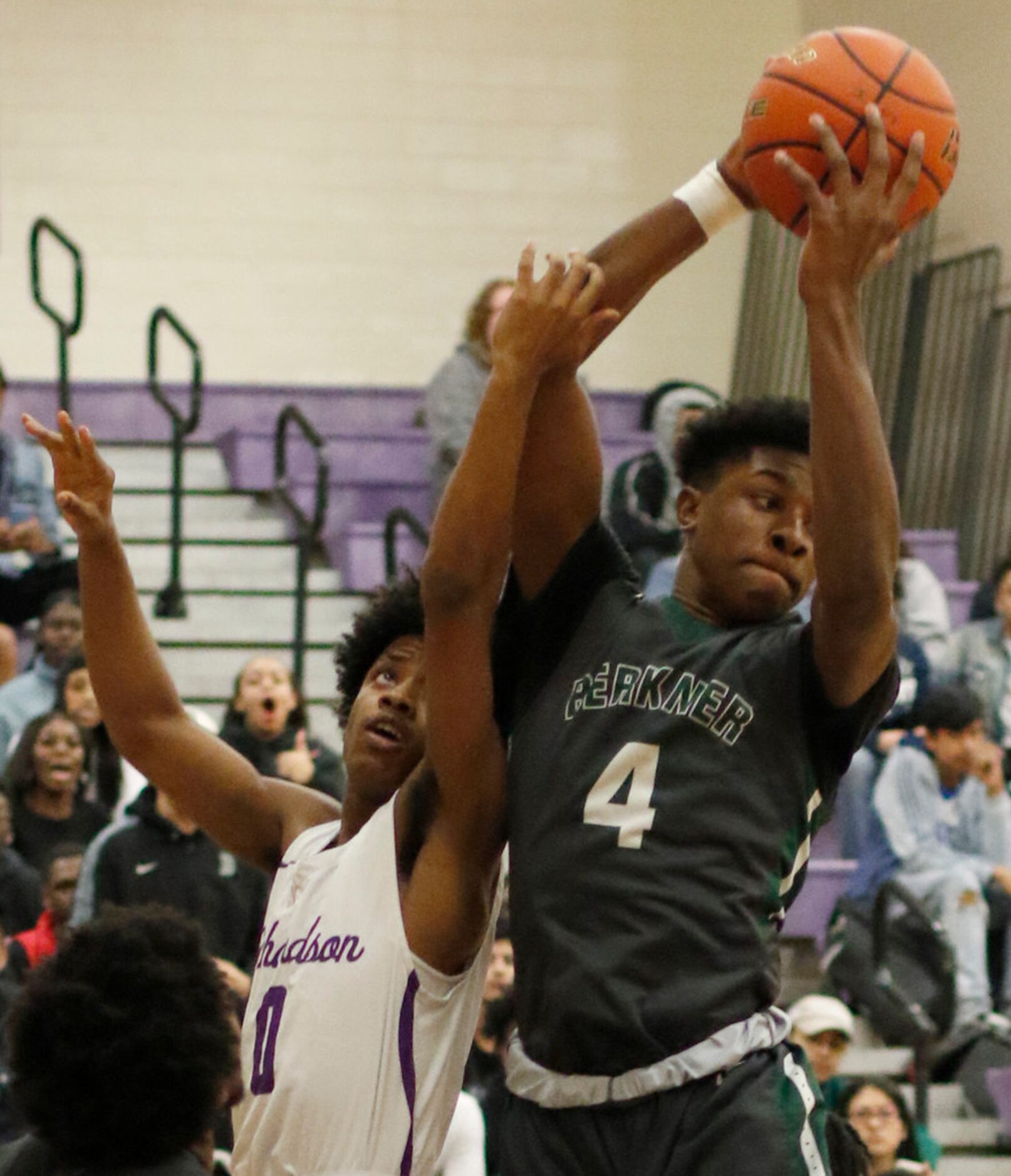 Richardson Berkner's Davonya Jefferson (4) pulls down a rebound as he is challenged by...