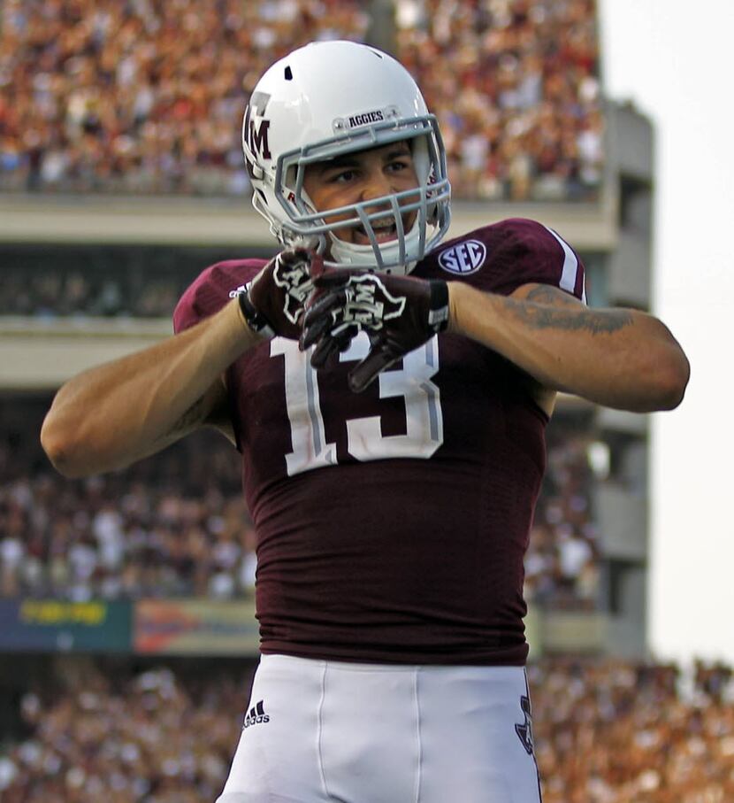 Texas A&M Aggies wide receiver Mike Evans celebrates his touchdown during the second half of...