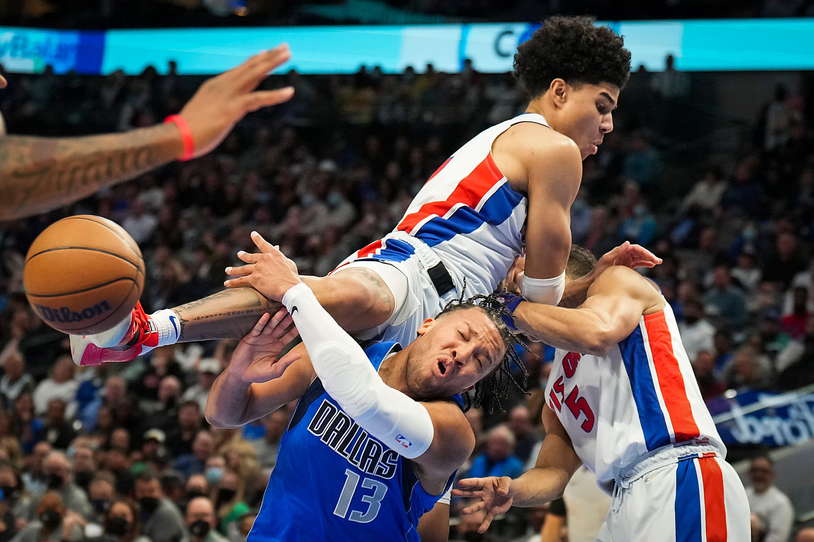 Dallas Mavericks guard Jalen Brunson (13) is fouled by Detroit Pistons guard Killian Hayes...