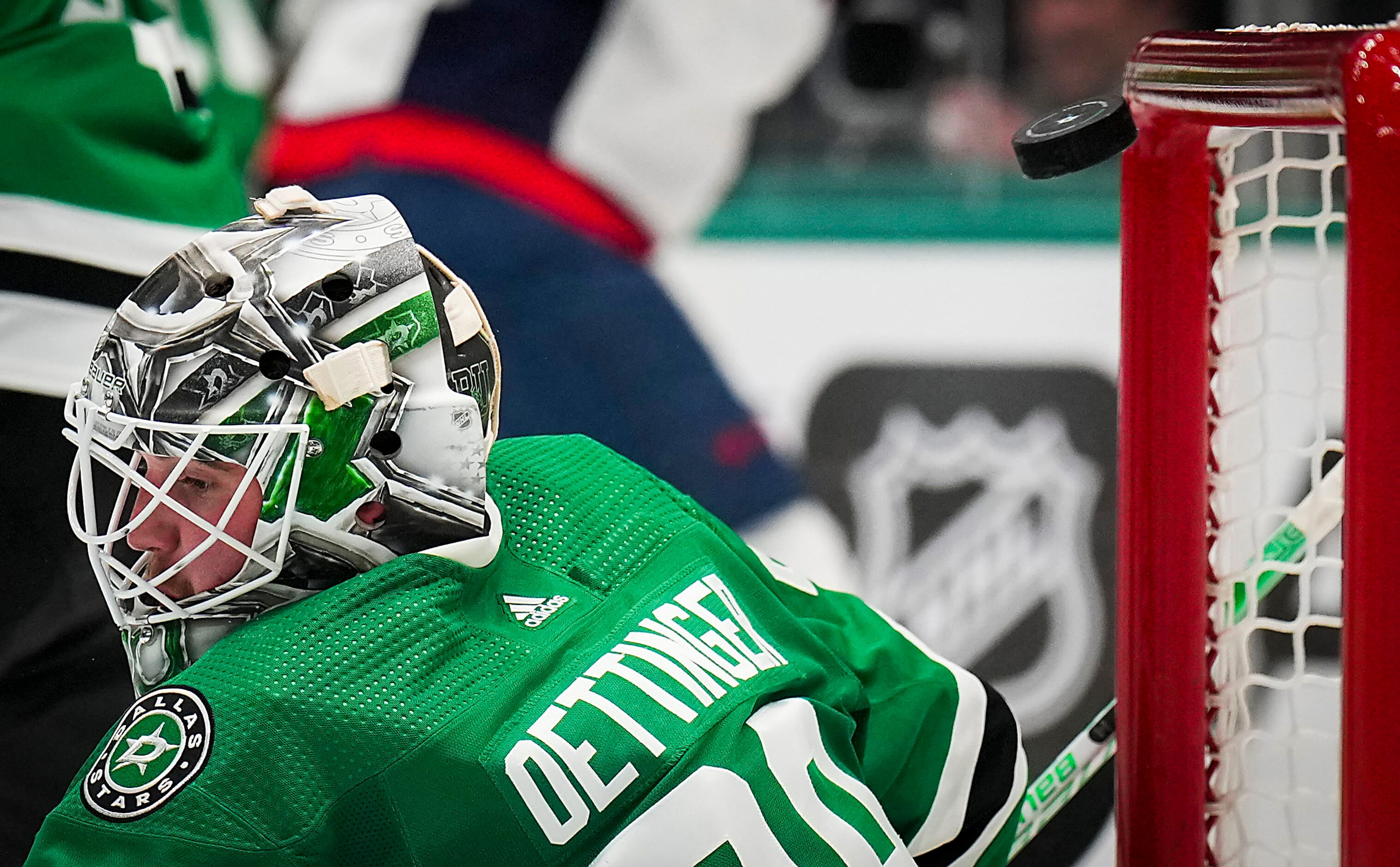 A Washington Capitals shot clanks off the crossbar behind Dallas Stars goaltender Jake...