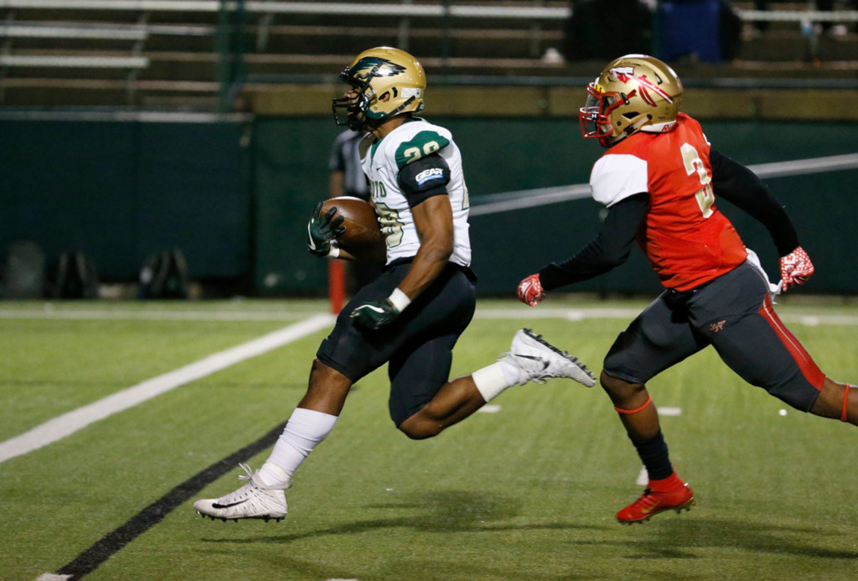 Desoto's Roston White runs the ball in for a touchdown against South Grand Prairie's Earl...