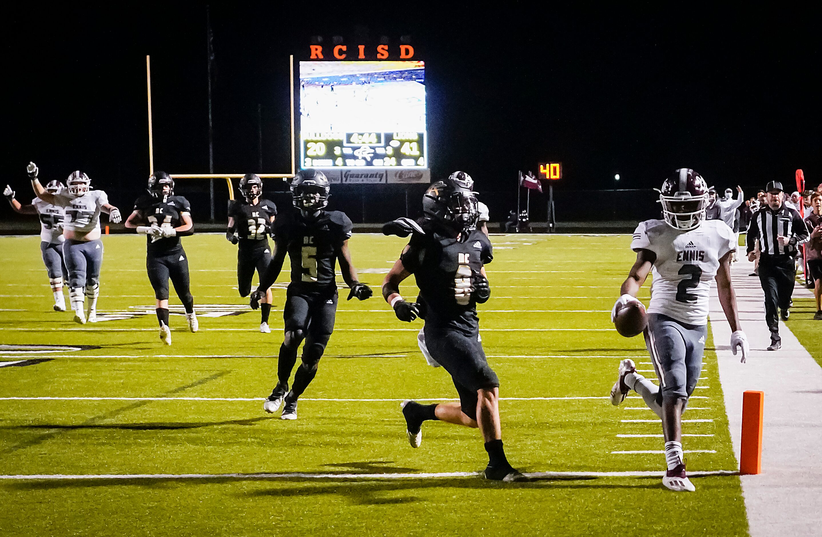 Ennis running back Dee Johnson (2) scores on a 24-yard touchdown run during the fourth...