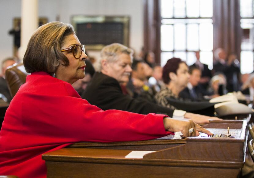 Rep. Senfronia Thompson, shown voting on the first day of the 2015 session, is pressing for...