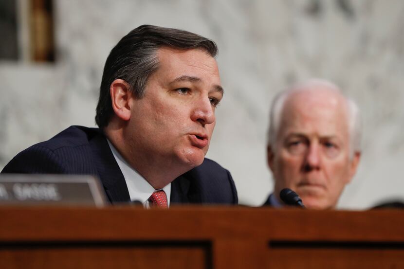 Sen. Ted Cruz (left), R-Texas, questions former Acting Attorney General Sally Yates and...