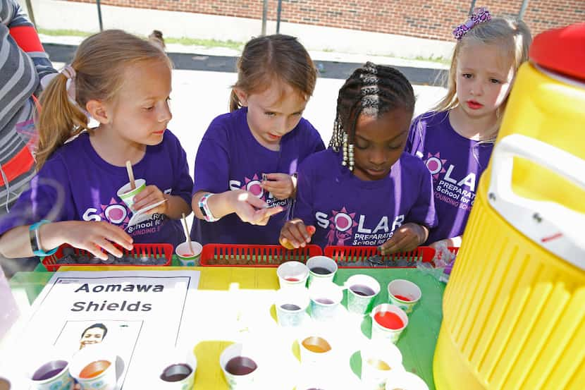 Claire Wickiser, 7, (from left) Micah Moss, 7, Kaylon Giddens, 7, and Riley Deal, 7, count...