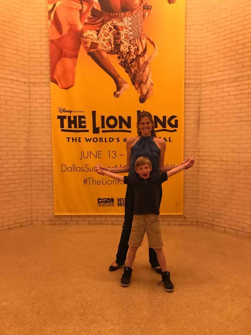 Landon Dehn, 8, and his mother, Danielle Dehn, attend The Lion King. 