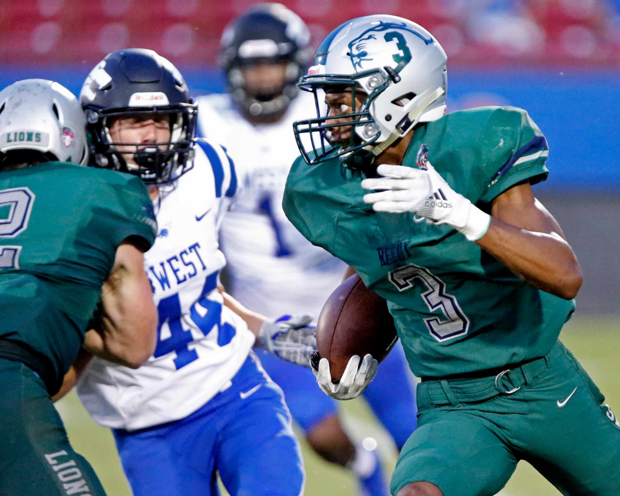 Reedy High School wide receiver Karim Muhammad (3) returns a field goal attempt to end the...