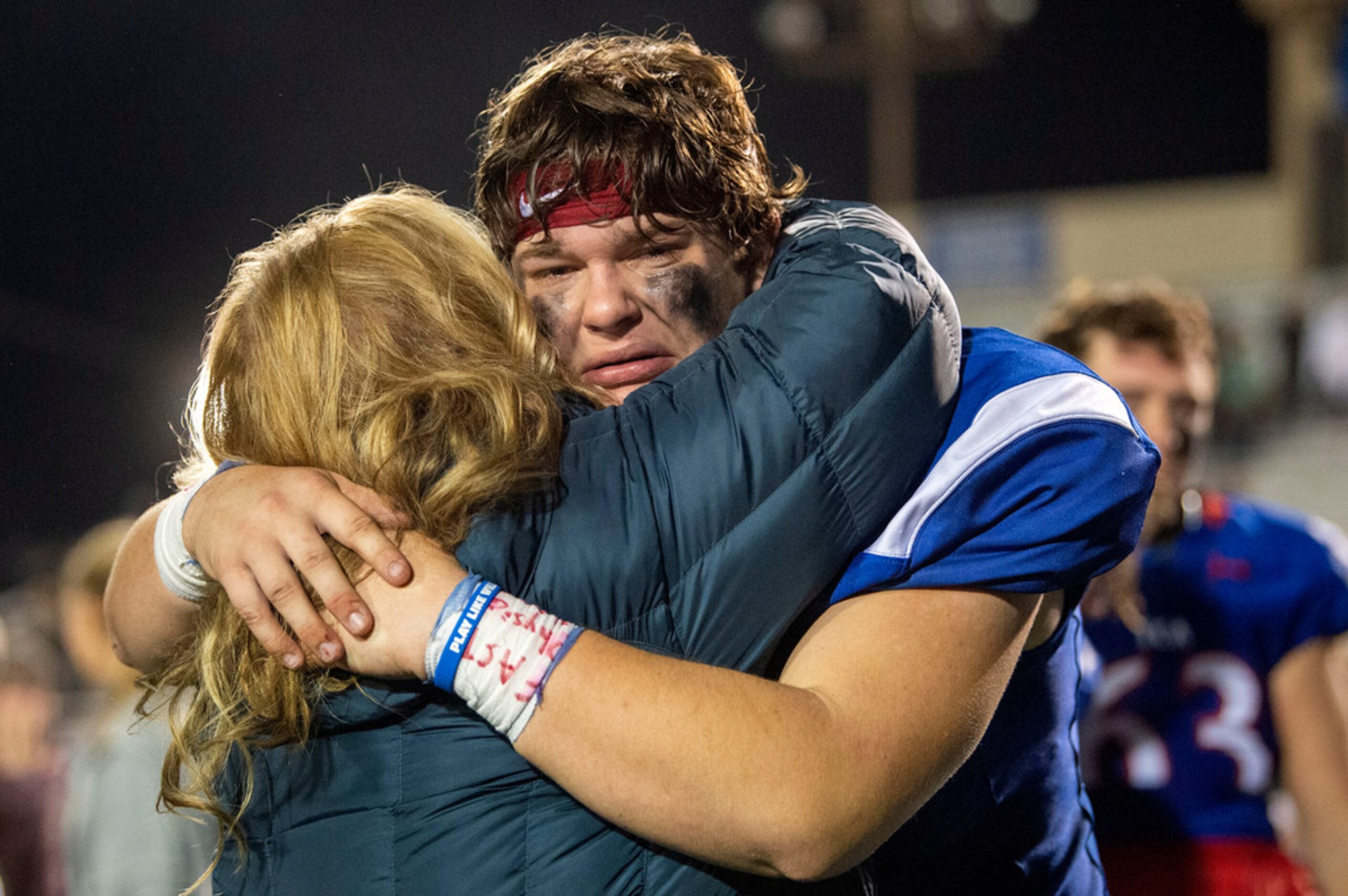 TCA-Addison center Philip Petersen is consoled by his mother Mica Petersen after TCA-Addison...