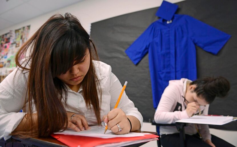 
Junior Dominique Campos works on an assignment in her government class. The school puts a...