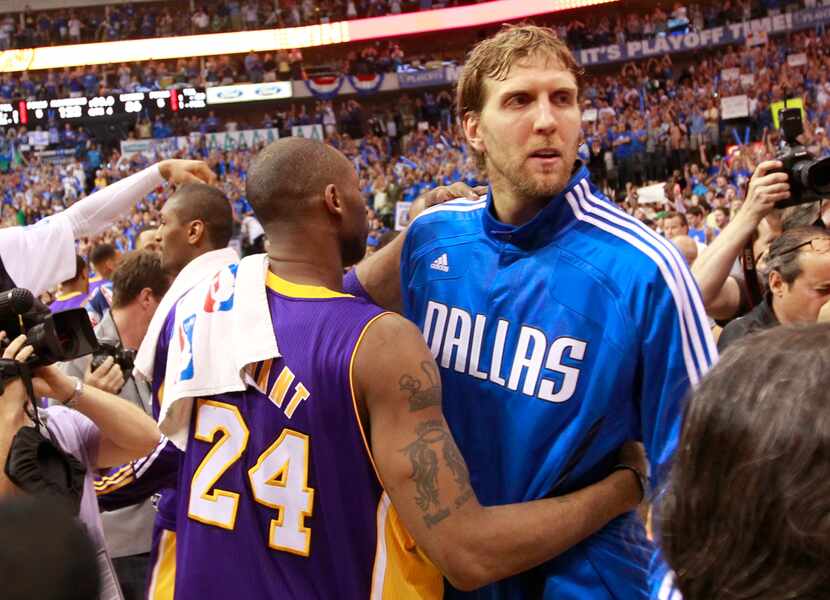 Los Angeles Lakers shooting guard Kobe Bryant congratulates Dallas Mavericks power forward...