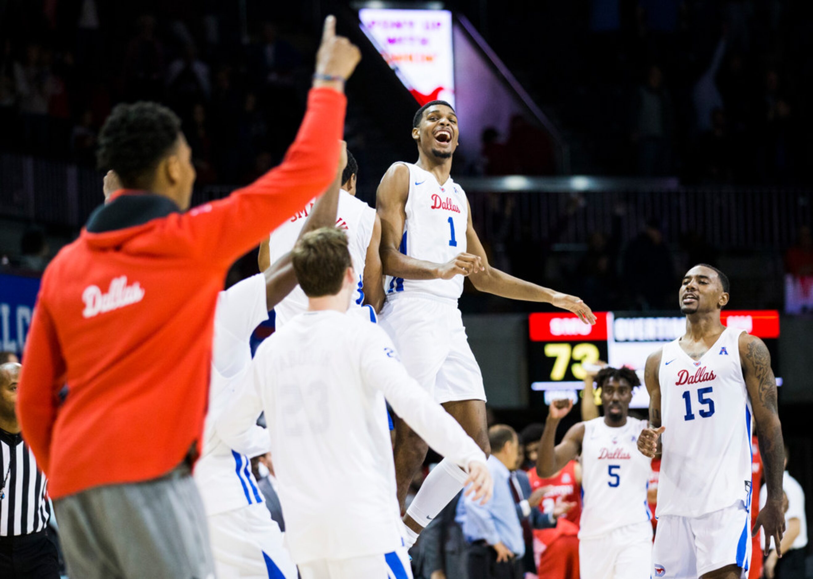 Southern Methodist Mustangs celebrates a 73-72 win in overtime of a basketball game between...