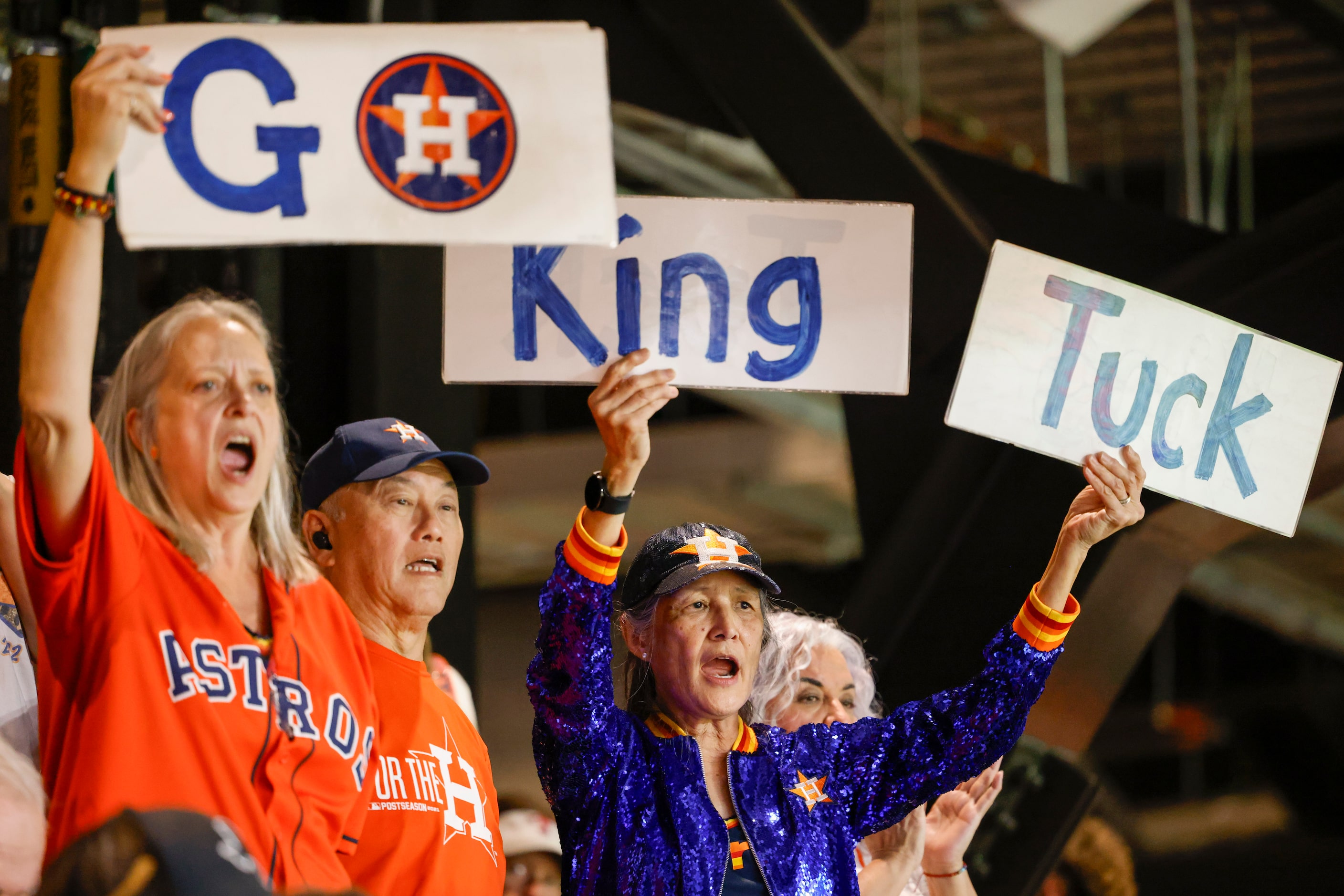 Houston Astros fan Barbara Moon (right), also known as Astros Sign Lady alongside other fans...