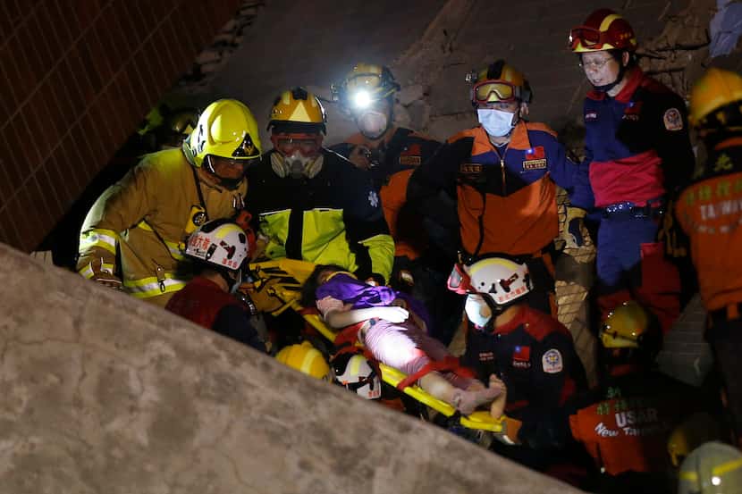 A young girl was rescued from a collapsed building complex after an early-morning earthquake...