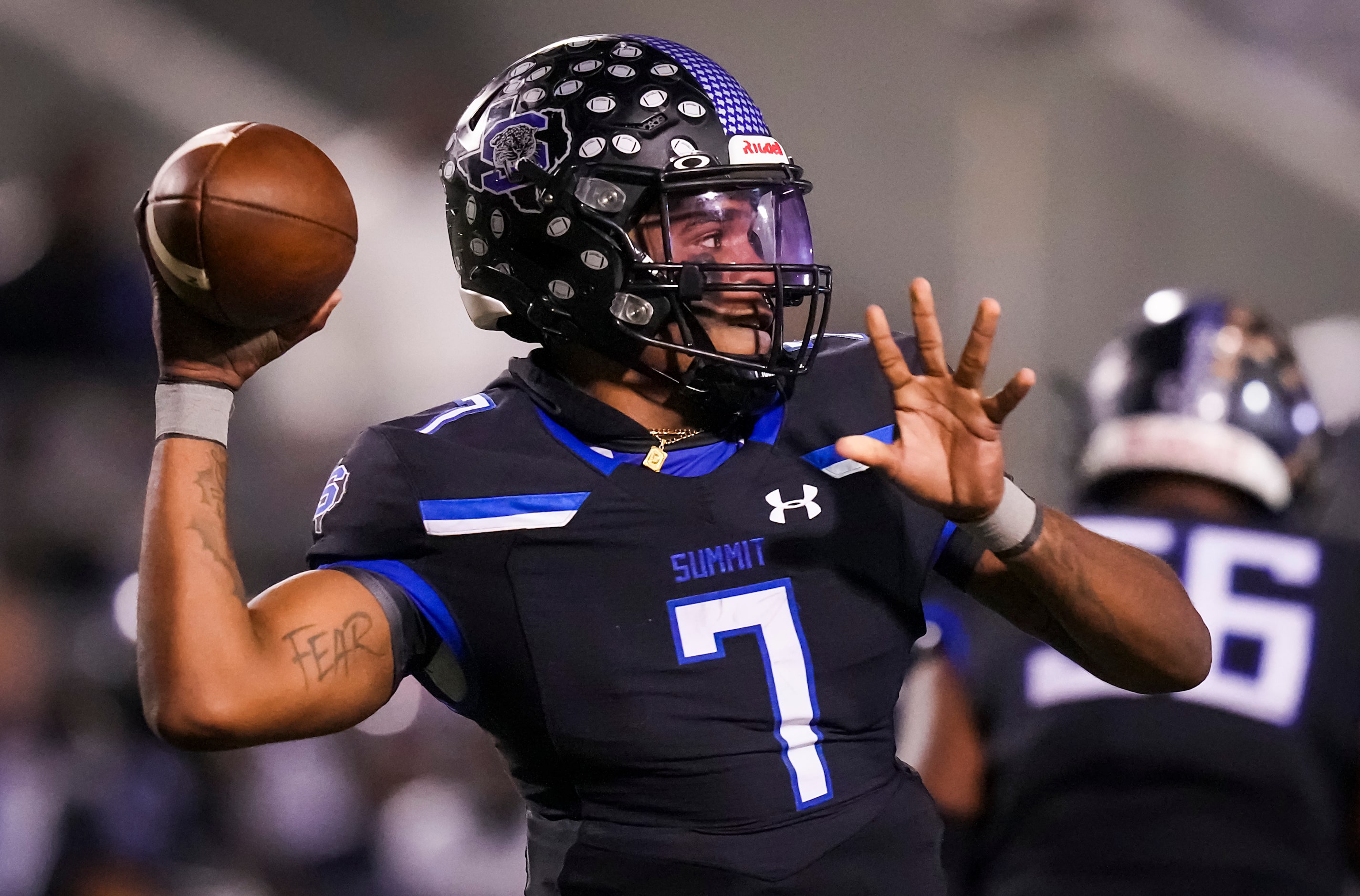 Mansfield Summit quarterback David Hopkins Jr. (7) throws a pass during the first half of...