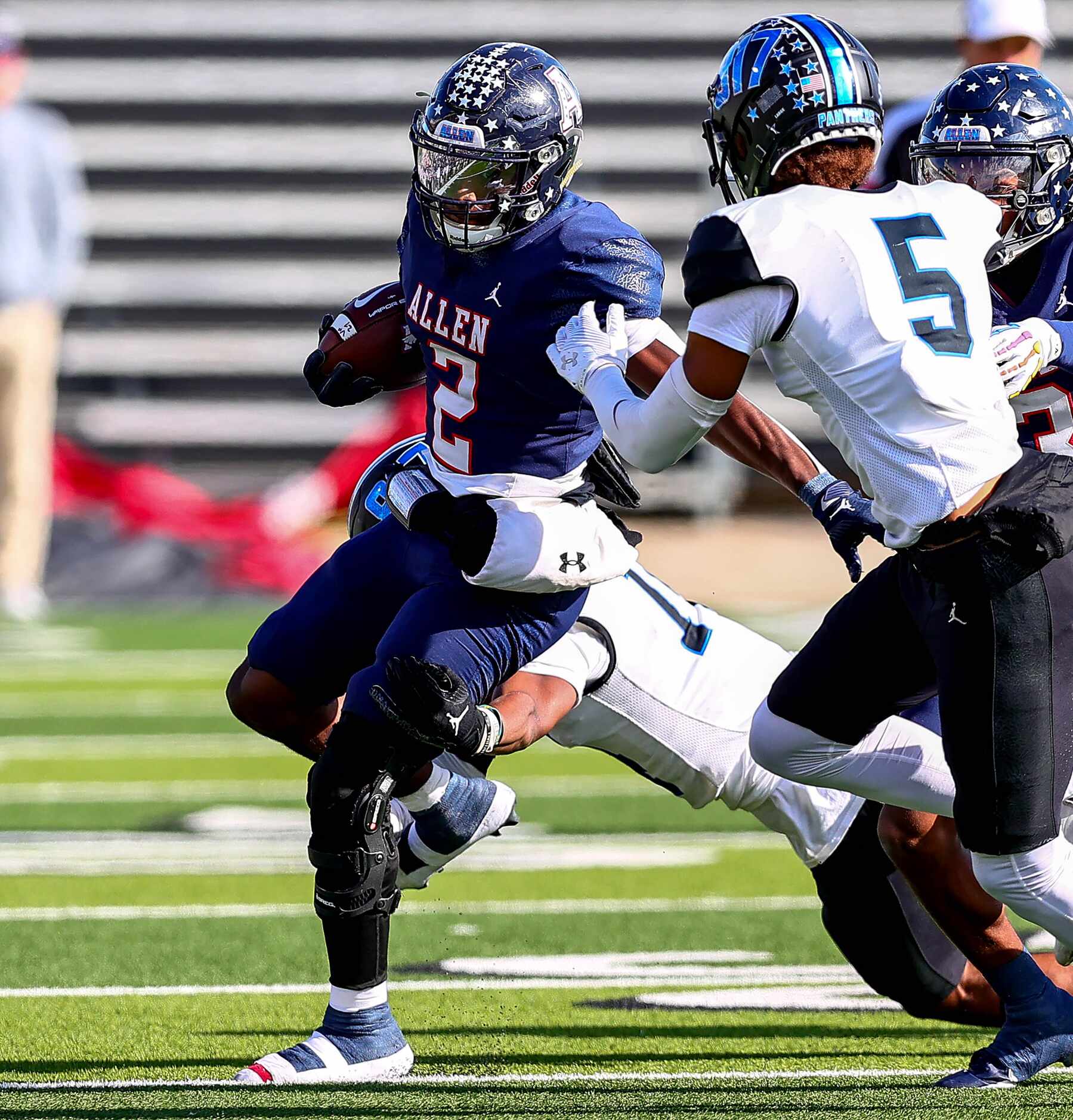 Allen running back Kayvion Sibley (2) fights for yardage against North Crowley during the...