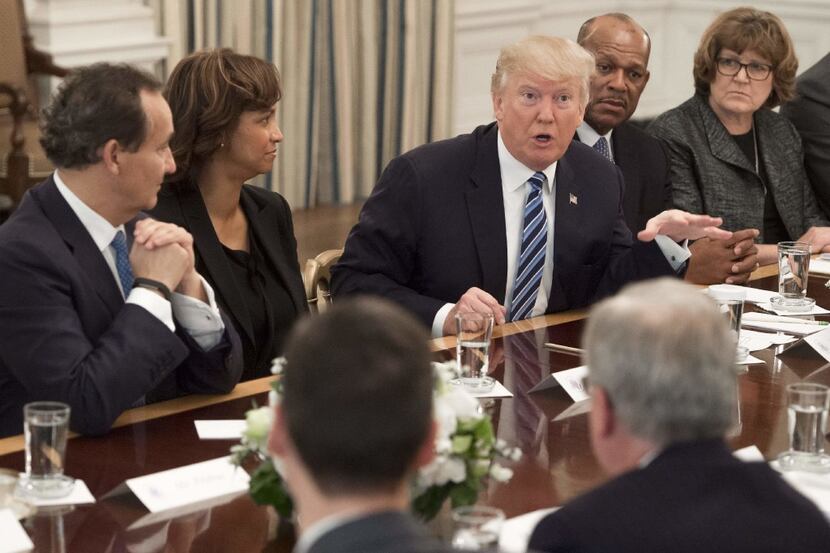 US President Donald Trump speaks during a meeting with airline industry executives,...
